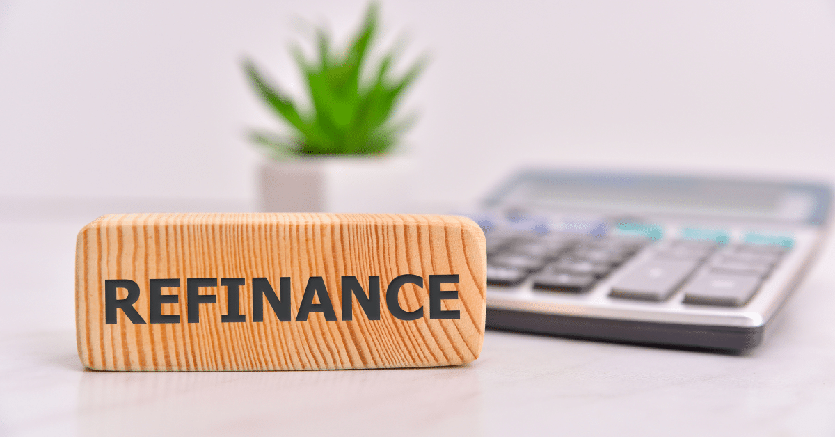 Refinance word on wooden block